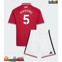 Camisa de Futebol Manchester United Harry Maguire #5 Equipamento Principal Infantil 2026-27 Manga Curta (+ Calças curtas)